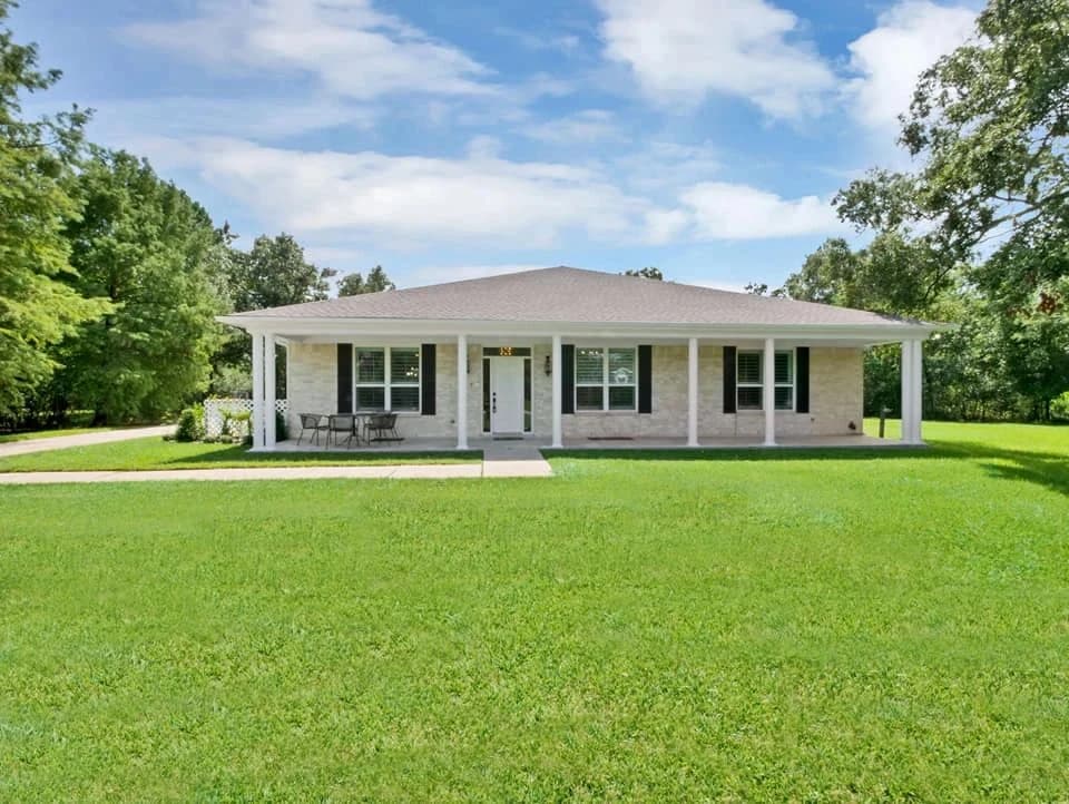 Single-story home with a broad front porch